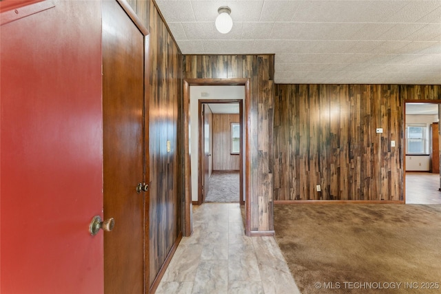 405 Dom Giaudrone, Mcalester, OK 74501 - corridor featuring wooden walls and baseboards