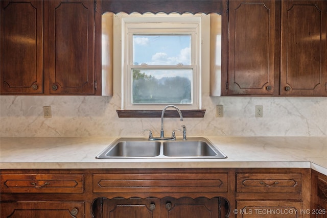 405 Dom Giaudrone, Mcalester, OK 74501 - kitchen with a sink, light countertops, and backsplash