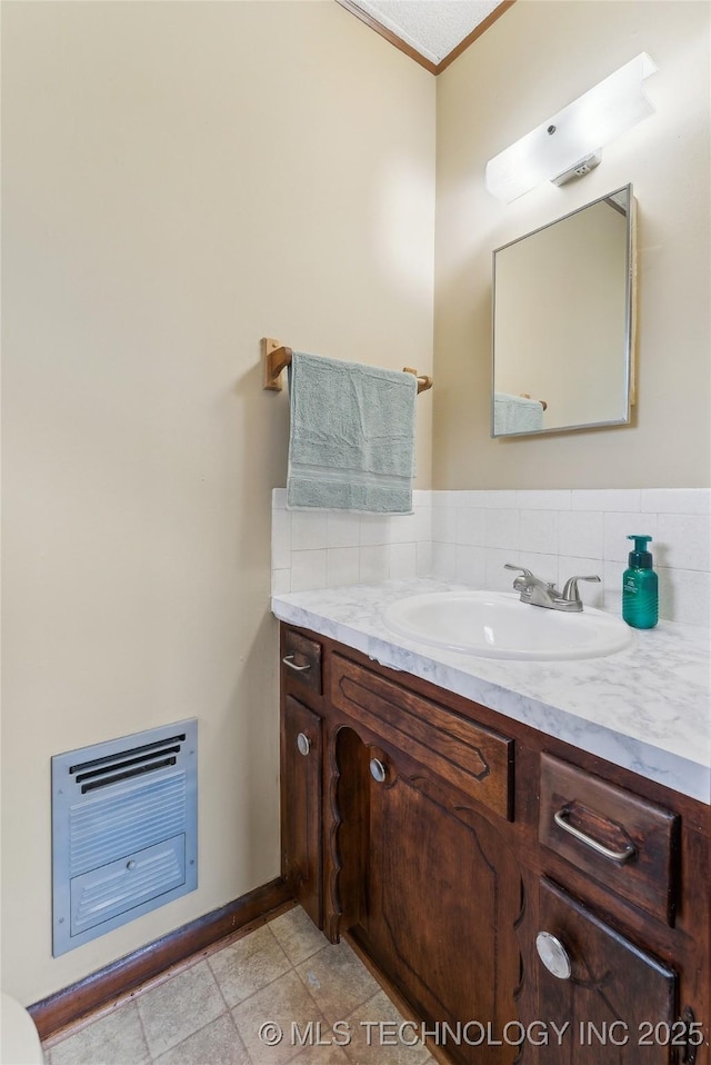 405 Dom Giaudrone, Mcalester, OK 74501 - half bath featuring vanity, crown molding, heating unit, and backsplash