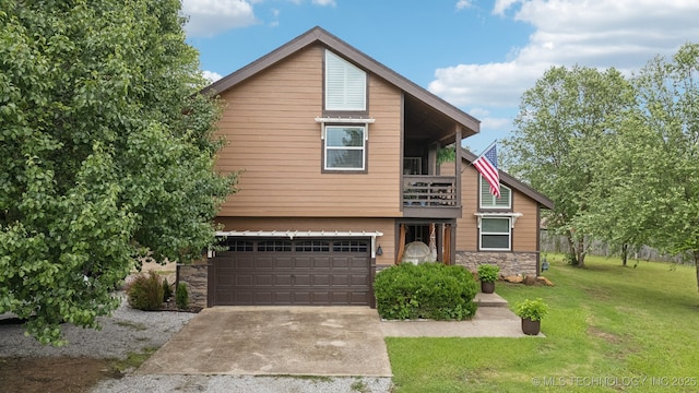 719 W Teel Rd, Sapulpa, OK 74066 - view of front of property with stone siding, a balcony, a front lawn, driveway, and an attached garage