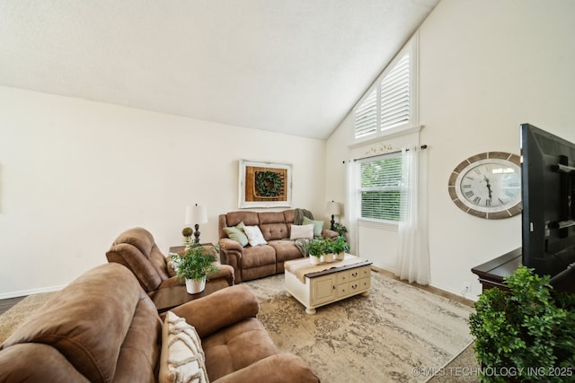 719 W Teel Rd, Sapulpa, OK 74066 - living area with high vaulted ceiling and baseboards
