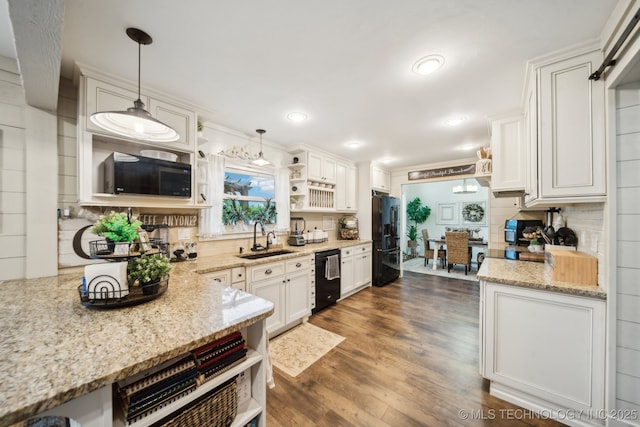 719 W Teel Rd, Sapulpa, OK 74066 - kitchen featuring open shelves, a sink, black appliances, tasteful backsplash, and recessed lighting