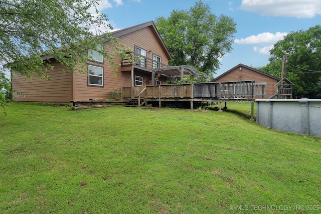 719 W Teel Rd, Sapulpa, OK 74066 - view of green lawn featuring a deck, a pergola, and an outdoor pool