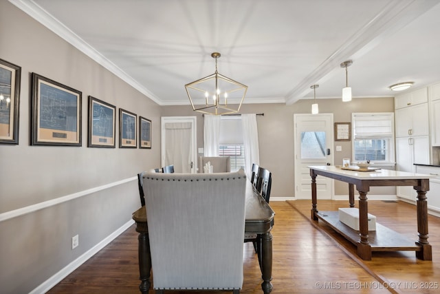 4104 S Owasso Ave, Tulsa, OK 74105 - dining area featuring a chandelier, dark wood-type flooring, ornamental molding, and baseboards