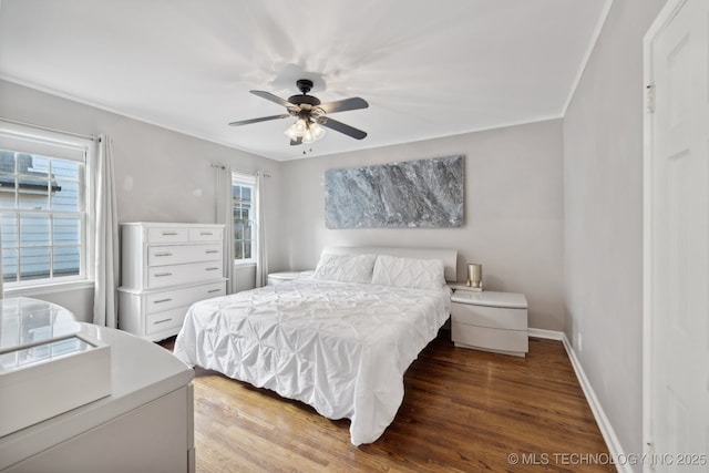 4104 S Owasso Ave, Tulsa, OK 74105 - bedroom with wood finished floors, baseboards, crown molding, and a ceiling fan