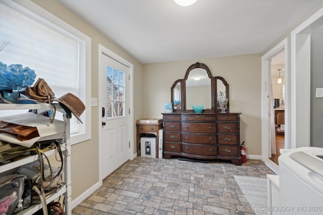 4104 S Owasso Ave, Tulsa, OK 74105 - entrance foyer featuring brick floors and baseboards