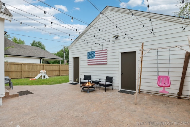 4104 S Owasso Ave, Tulsa, OK 74105 - rear view of house featuring a fire pit and a patio area