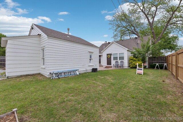 4104 S Owasso Ave, Tulsa, OK 74105 - rear view of house featuring a patio area and a shingled roof