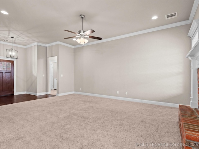 5506 Ashbrook Dr, Bartlesville, OK 74006 - unfurnished living room featuring dark carpet, ceiling fan, recessed lighting, baseboards, and crown molding