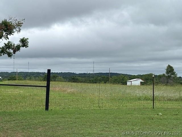 805 E 10th St, Claremore, OK 74017 - view of yard featuring a view of countryside