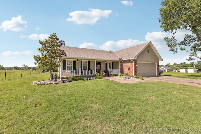 805 E 10th St, Claremore, OK 74017 - ranch-style home featuring covered porch, driveway, a garage, brick siding, and roof with shingles