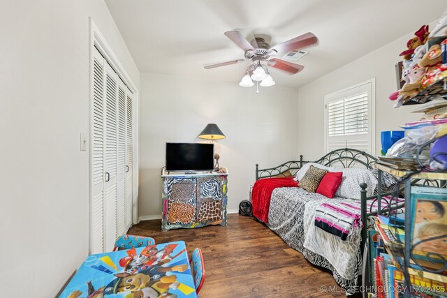 805 E 10th St, Claremore, OK 74017 - bedroom with a closet, wood finished floors, ceiling fan, and baseboards