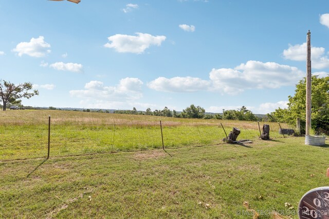 805 E 10th St, Claremore, OK 74017 - view of green lawn featuring a view of countryside