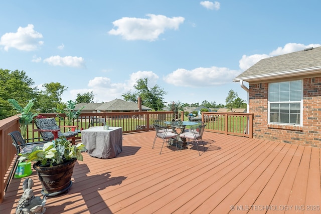805 E 10th St, Claremore, OK 74017 - deck with outdoor dining area