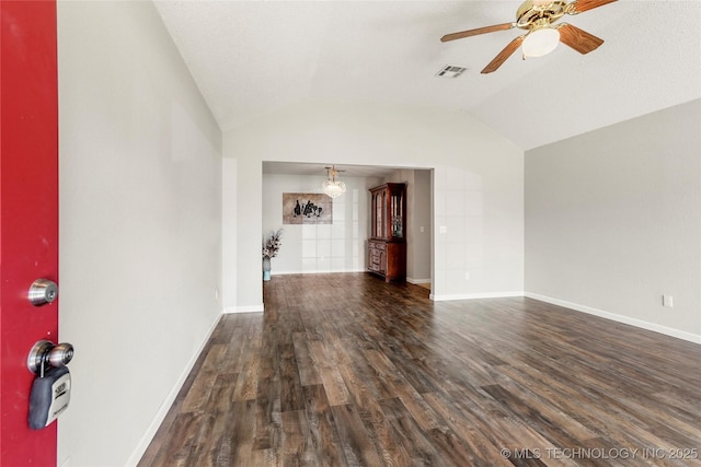 1309 N Willow Ave, Broken Arrow, OK 74012 - unfurnished living room featuring ceiling fan, vaulted ceiling, dark wood finished floors, and baseboards