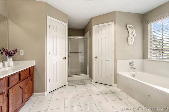 1309 N Willow Ave, Broken Arrow, OK 74012 - bathroom with vanity, plenty of natural light, a shower stall, and a bath
