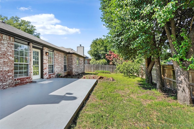 1309 N Willow Ave, Broken Arrow, OK 74012 - view of yard with a patio
