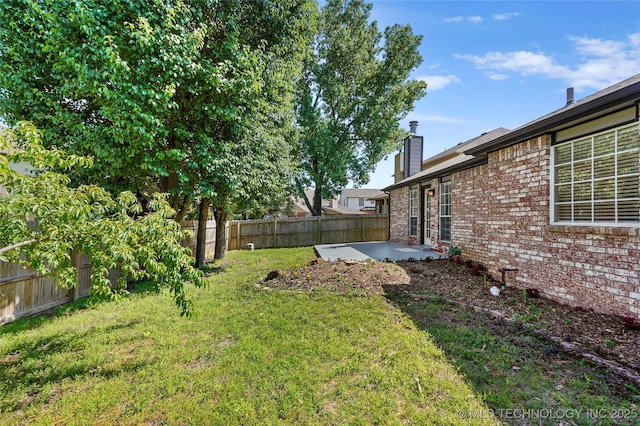 1309 N Willow Ave, Broken Arrow, OK 74012 - view of yard with a patio area