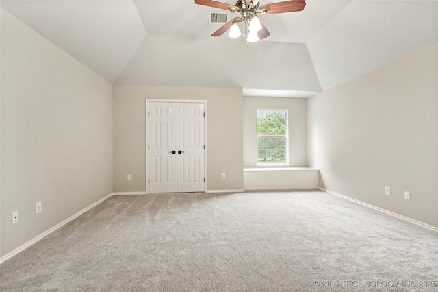 13041 E 67th St, Broken Arrow, OK 74012 - unfurnished bedroom featuring carpet floors, lofted ceiling, baseboards, and ceiling fan