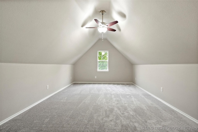 13041 E 67th St, Broken Arrow, OK 74012 - additional living space featuring a ceiling fan, carpet flooring, baseboards, and lofted ceiling