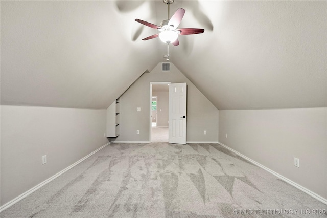 13041 E 67th St, Broken Arrow, OK 74012 - additional living space featuring ceiling fan, carpet flooring, baseboards, and lofted ceiling