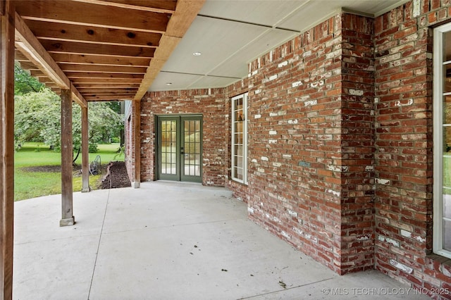 13041 E 67th St, Broken Arrow, OK 74012 - view of patio featuring french doors