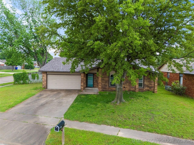901 S Lions Ave, Broken Arrow, OK 74012 - view of front facade with a garage, driveway, a front lawn, and brick siding