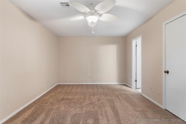 901 S Lions Ave, Broken Arrow, OK 74012 - empty room featuring carpet floors, ceiling fan, and baseboards