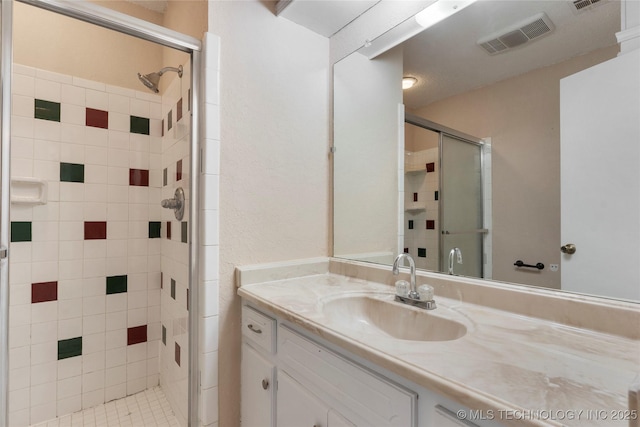 901 S Lions Ave, Broken Arrow, OK 74012 - bathroom featuring vanity and a shower stall