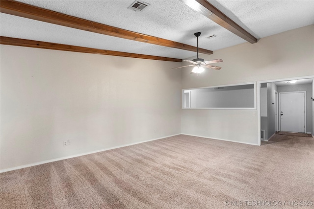 901 S Lions Ave, Broken Arrow, OK 74012 - spare room featuring carpet floors, beam ceiling, a ceiling fan, a textured ceiling, and baseboards