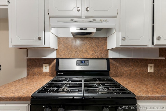 901 S Lions Ave, Broken Arrow, OK 74012 - kitchen featuring stainless steel range with gas cooktop, white cabinetry, under cabinet range hood, and decorative backsplash