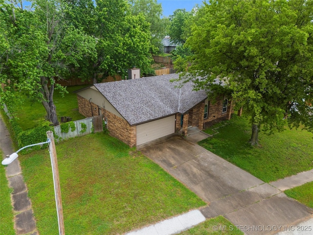 901 S Lions Ave, Broken Arrow, OK 74012 - view of front of home with stone siding, concrete driveway, a garage, and a shingled roof