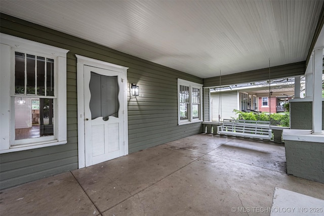 316 K St SW, Ardmore, OK 73401 - unfurnished sunroom with healthy amount of natural light