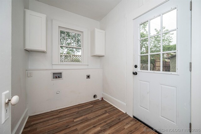 316 K St SW, Ardmore, OK 73401 - laundry area featuring cabinet space, hookup for a washing machine, hookup for an electric dryer, and plenty of natural light