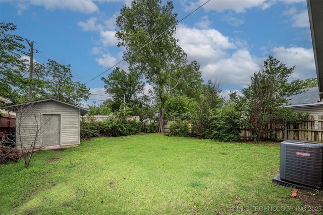 316 K St SW, Ardmore, OK 73401 - view of yard featuring central AC unit