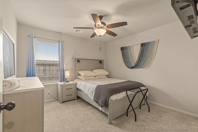 7506 E 87th Pl, Owasso, OK 74055 - bedroom with light colored carpet and ceiling fan