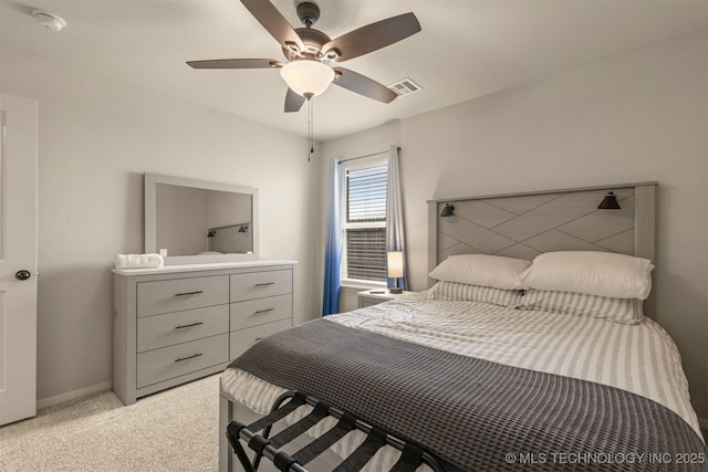 7506 E 87th Pl, Owasso, OK 74055 - bedroom featuring light carpet and ceiling fan