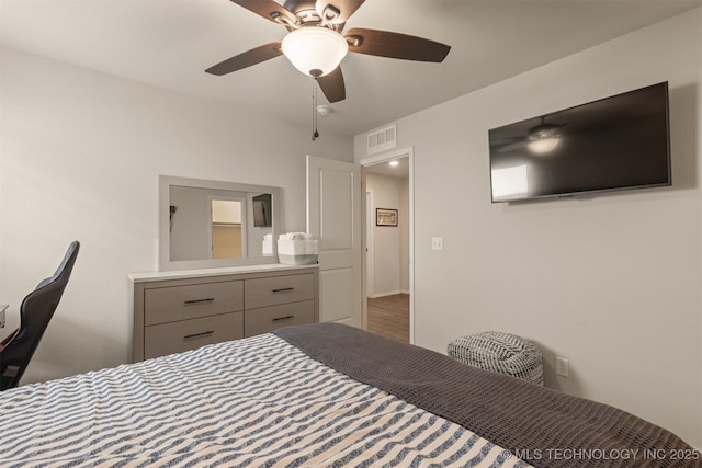 7506 E 87th Pl, Owasso, OK 74055 - bedroom with a ceiling fan