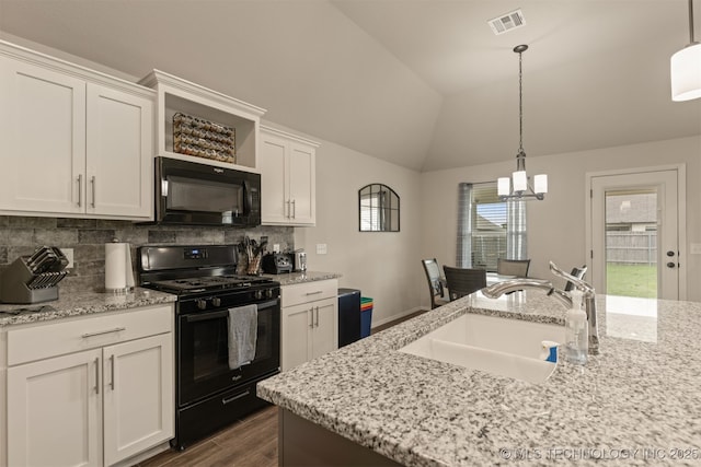 7506 E 87th Pl, Owasso, OK 74055 - kitchen featuring black appliances, a chandelier, white cabinets, decorative backsplash, and lofted ceiling