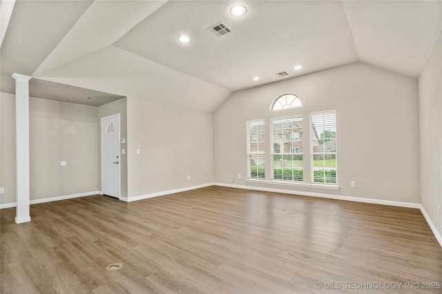 4309 W College St, Broken Arrow, OK 74012 - unfurnished living room with vaulted ceiling, wood finished floors, baseboards, and recessed lighting