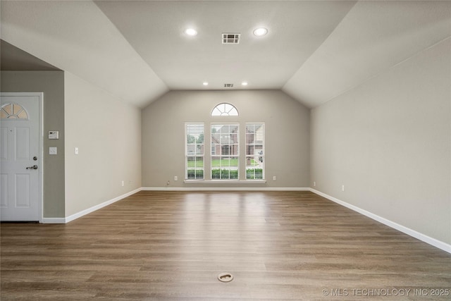 4309 W College St, Broken Arrow, OK 74012 - unfurnished living room with recessed lighting, wood finished floors, lofted ceiling, and baseboards