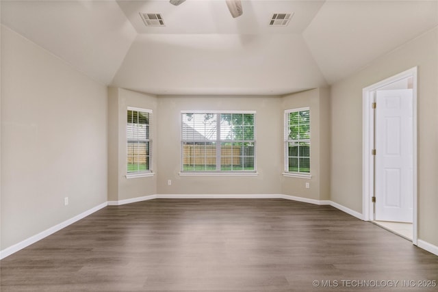 4309 W College St, Broken Arrow, OK 74012 - empty room featuring wood finished floors, vaulted ceiling, a ceiling fan, and baseboards