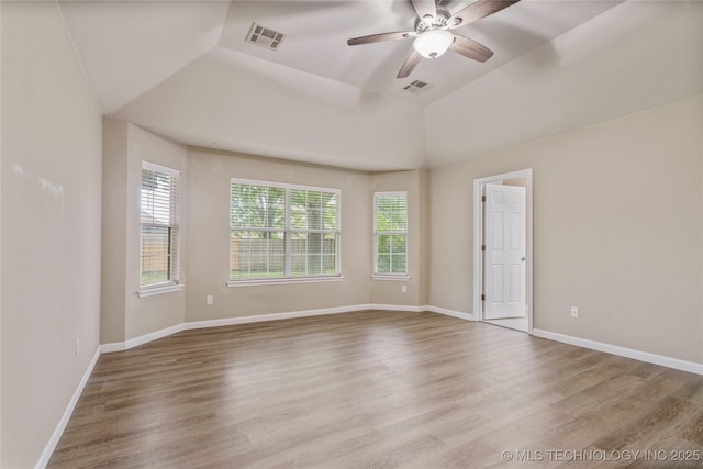 4309 W College St, Broken Arrow, OK 74012 - unfurnished room featuring a ceiling fan, wood finished floors, baseboards, and a raised ceiling