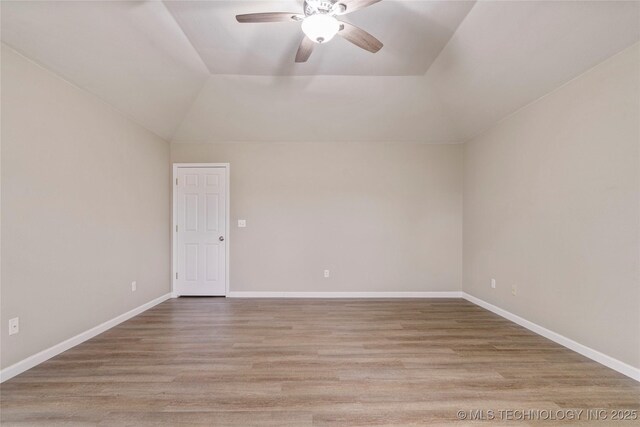 4309 W College St, Broken Arrow, OK 74012 - spare room with ceiling fan, lofted ceiling, light wood finished floors, and baseboards