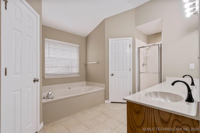 4309 W College St, Broken Arrow, OK 74012 - full bathroom featuring a bath, a stall shower, double vanity, tile patterned floors, and vaulted ceiling