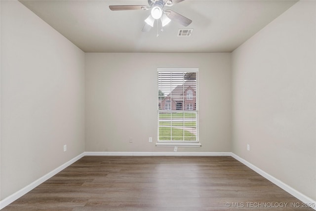 4309 W College St, Broken Arrow, OK 74012 - spare room featuring a ceiling fan, baseboards, and wood finished floors