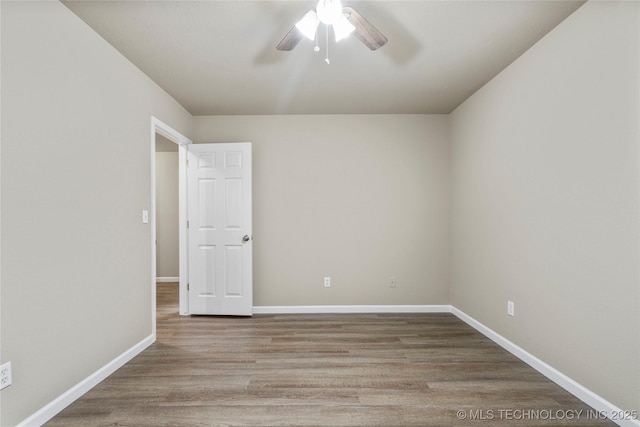 4309 W College St, Broken Arrow, OK 74012 - unfurnished room with ceiling fan, wood finished floors, and baseboards
