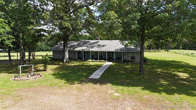 175 Johnson Rd, Broken Bow, OK 74728 - single story home with a front lawn, a chimney, and a porch