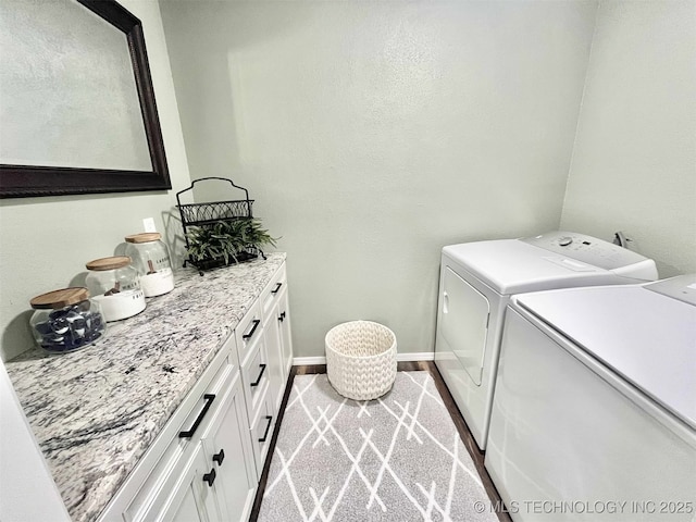 175 Johnson Rd, Broken Bow, OK 74728 - laundry area with washing machine and clothes dryer, cabinet space, and baseboards