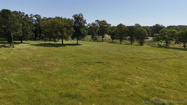 175 Johnson Rd, Broken Bow, OK 74728 - view of green lawn featuring a view of rural / pastoral area